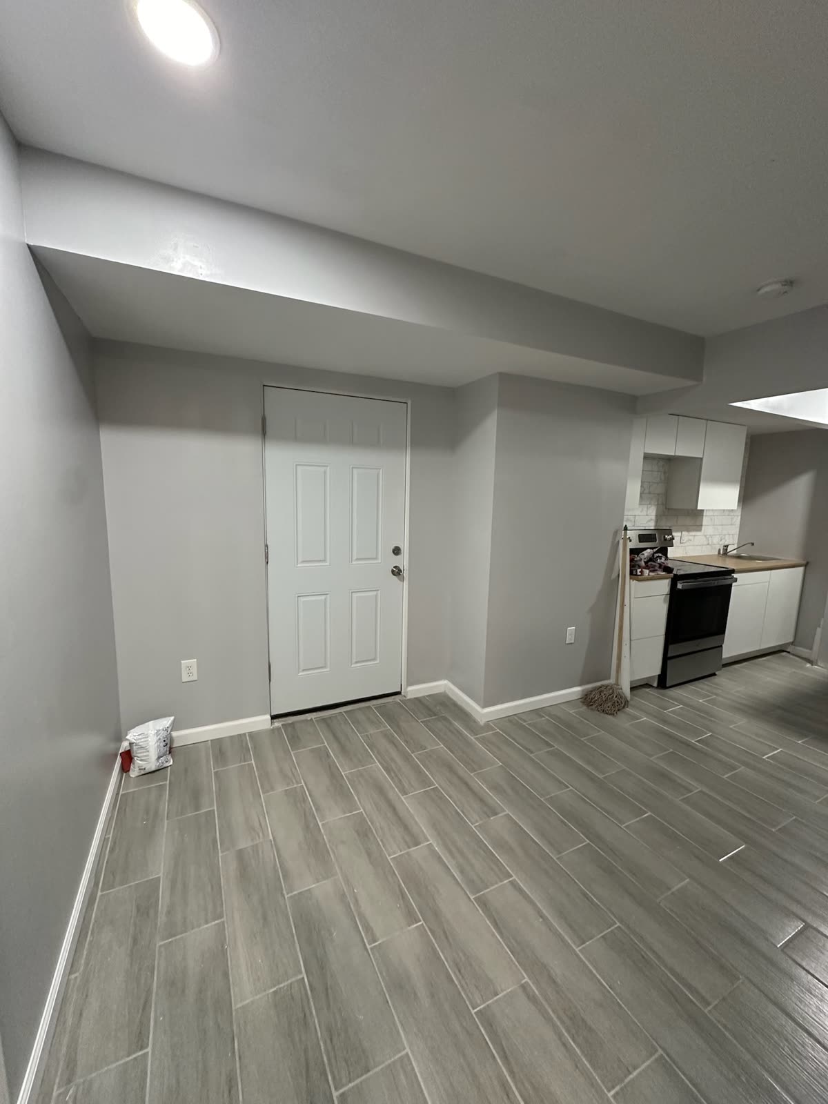 Finished rental living space and kitchenette maintained by ARCED